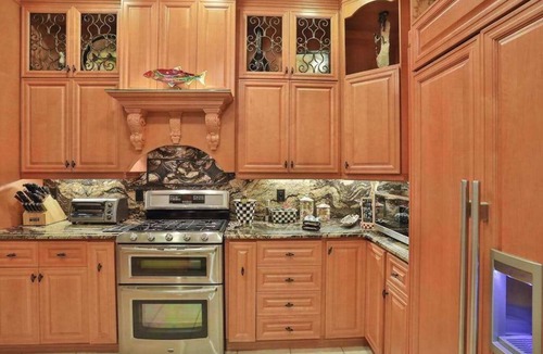 Naples House | Upscale waterfront home with private dock, saltwater pool, lanai, grill, & W/D