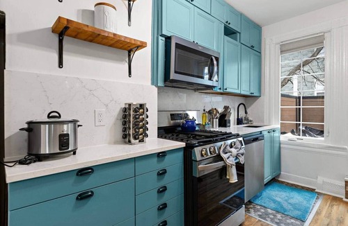 McGinley Square Apartment | Urban Oasis 3BR Duplex w/Patio Easy NYC Access
