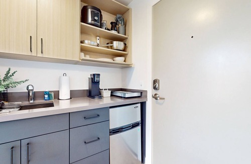 Old Ballard Apartment | Urban studio unit with patio views, shared lounge space and dedicated workspace