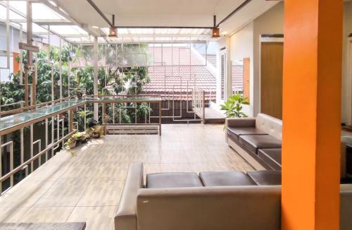 Dinoyo House | Urbanview Java Living Sigura Gura