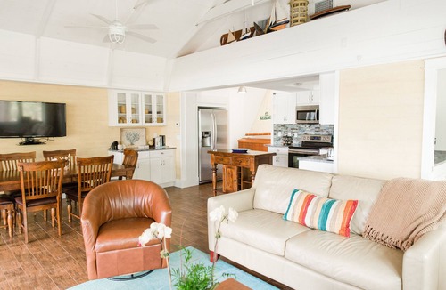 Placida House | Use our kayaks to explore; your boat is in view at our dock; boardwalk to beach
