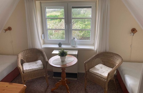 Vitte Apartment | Vacation apartment 2 west - Holiday home Butje
