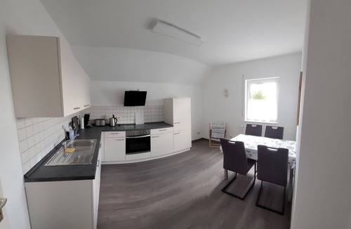 Echzell Apartment | Vacation apartment Bischof - modern vacation apartment "Am Ried" with a view