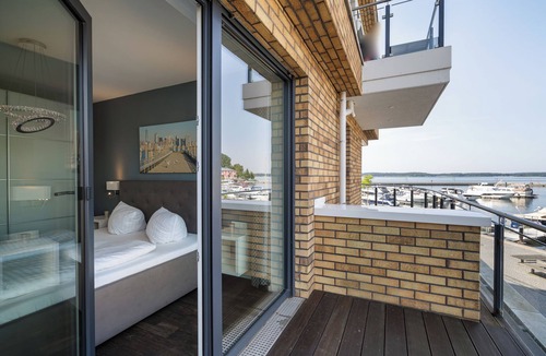Muritz Apartment | Vacation apartment with water view on the 1st floor of the Hafenresidenz Waren