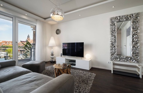 Muritz Apartment | Vacation apartment with water view on the 1st floor of the Hafenresidenz Waren