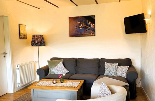 Utzerath House | Vacation apartment Obstgarten - Landgut Pfauenhof