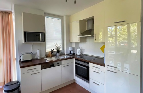 Grossenbrode Apartment | Vacation apartment Sonnenschein 17 in Großenbrode. Bed + Bike certified. Cozy feel-good atmosphere with sauna, underfloor heating & wood-burning stove. Windbreak, beach chairs & selection of beach toys included