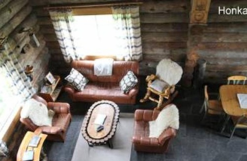 Kuhmo House | Vacation home Pykälä - log village in Kuhmo - 17 persons, 5 bedrooms