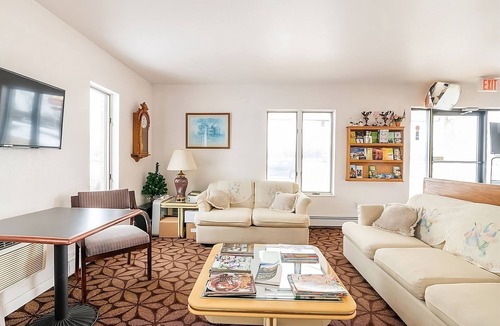Chesaning House | Vacation Starts Here! 4 Convenient Units, Free Parking, Pets Are Welcome!