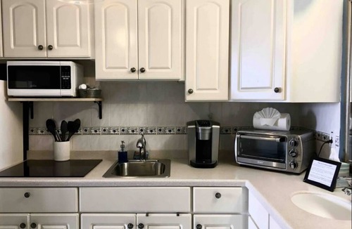 Ortona Park Apartment | Value studio in N Daytona Beach with pools, spa, kitchenette and beach gear!