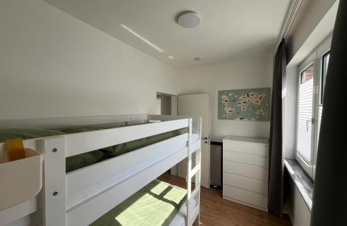 Bensersiel Apartment | Vier Nordlichter Erdgeschosswohnung mit Terrasse und Garten