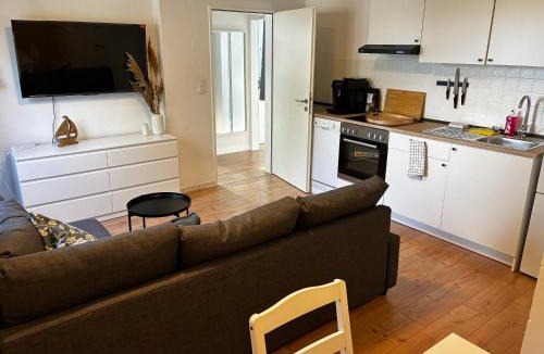Bensersiel Apartment | Vier Nordlichter Erdgeschosswohnung mit Terrasse und Garten