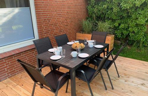 Bensersiel Apartment | Vier Nordlichter Erdgeschosswohnung mit Terrasse und Garten