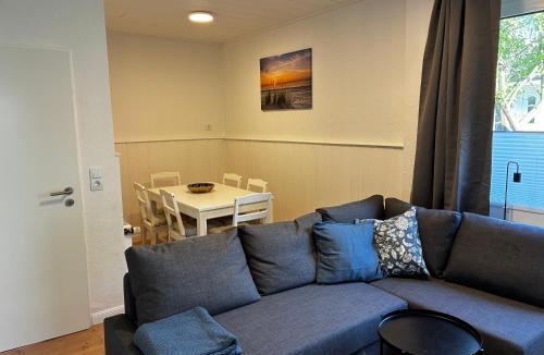 Bensersiel Apartment | Vier Nordlichter Erdgeschosswohnung mit Terrasse und Garten