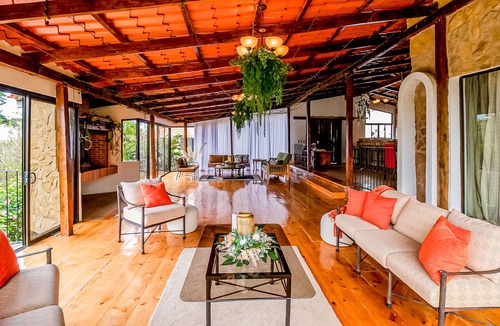 Roble House | View paradise with an expansive yard, wood-burning fireplace, and W/D
