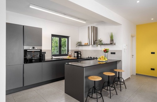 Vrvari Villa | Villa Anni for 10 people in Porec with heated pool, sea view & kids room and playground