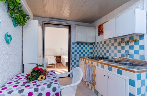 Torre Lapillo Villa | Villa 'Bilocale A Torre Lapillo' with Shared Terrace and Air Conditioning