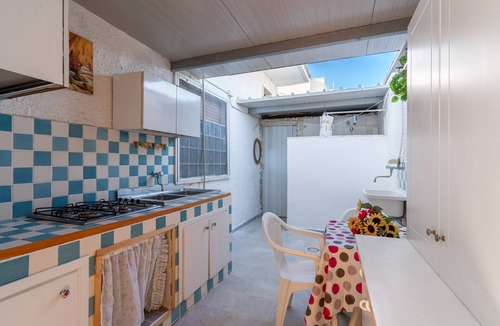 Torre Lapillo Villa | Villa 'Bilocale A Torre Lapillo' with Shared Terrace and Air Conditioning