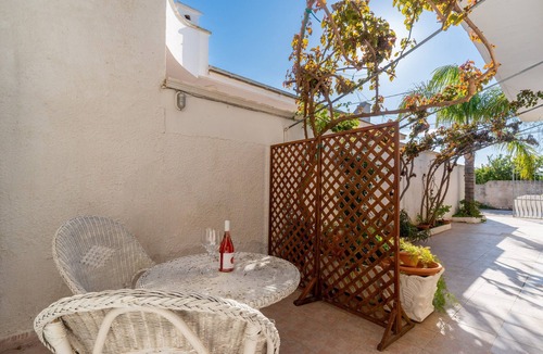 Torre Lapillo Villa | Villa 'Bilocale A Torre Lapillo' with Shared Terrace and Air Conditioning