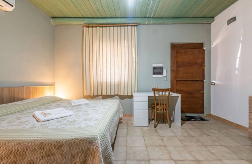 San Giovanni Suergiu Villa | Villa 'Camera 3' with Shared Pool, Wi-Fi and Air Conditioning