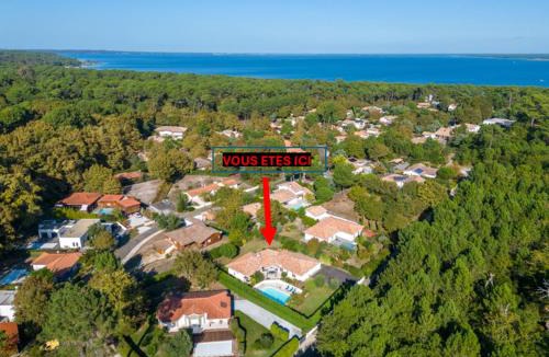 Biscarrosse Villa | Villa familiale avec piscine chauffée, clim, 4 chambres, proche golf et plages - FR-1-319-565