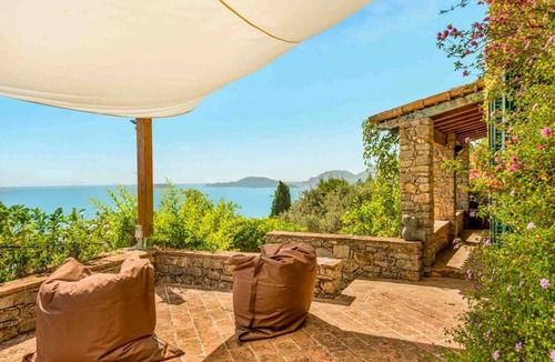 Lerici Villa | Villa Il Tuffatore – Authentic Rustic Charm with Breathtaking Views over the Gulf of PoetsNestled in the silence and scents of the Mediterranean maquis, Villa Il Tuffatore is a haven of authentic Ligurian charm, where time seems to slow down. Located i