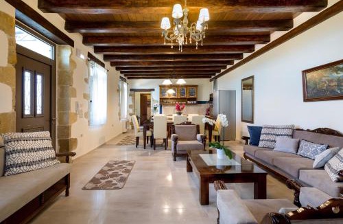 Tzitzifes Villa | Villa Kois - Authentic Stone Villa with Waterfall Pool by Posarelli Villas