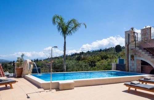 Tzitzifes Villa | Villa Kois - Authentic Stone Villa with Waterfall Pool by Posarelli Villas