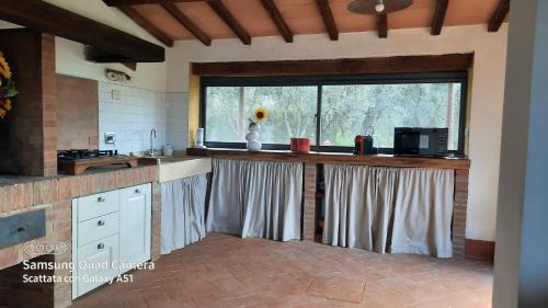 Donoratico House | Villa Lorenzo con wi-fi, aria condizionata, posto auto