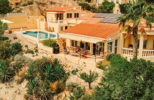 Coveta Fuma Ski Chalet | Villa Oliva – Stylish Cliffside Villa in Coveta Fuma with Spectacular Sea Views