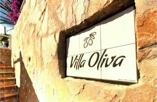 Coveta Fuma Ski Chalet | Villa Oliva – Stylish Cliffside Villa in Coveta Fuma with Spectacular Sea Views