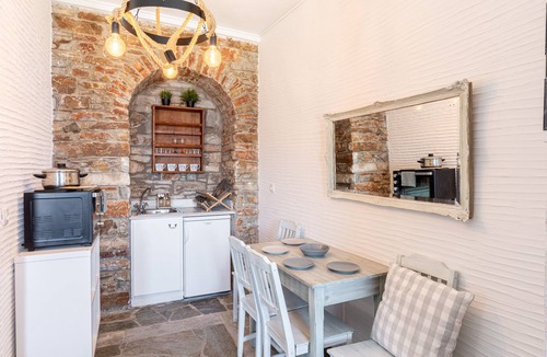 Panormos Villa | Villa Perraki - Limestone and marble accented villa on Rochari Beach