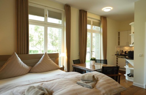 Hohe Dune Apartment | Villa Schmidt Apartments - Strandhaus direkt am Meer mit Sauna, Sport und Dünengarten - Komfort