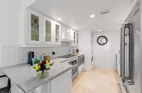 West Bay Condo | Villa Steps From The Sand