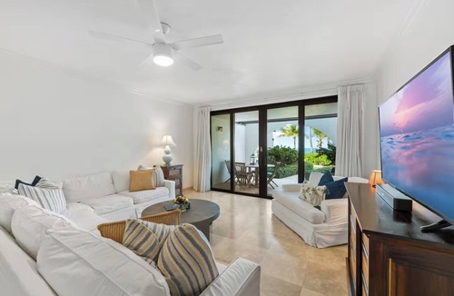 West Bay Condo | Villa Steps From The Sand