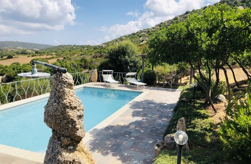 Arzachena House | Villa with panoramic pool surrounded by greenery