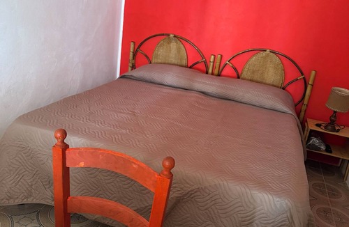 Stromboli Villa | Villa with patio surrounded by greenery, equipped kitchen on the patio. Close to the sea