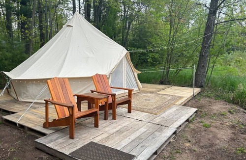 Pine City RV Rental | Vintage Dome tent pondside with spa use!