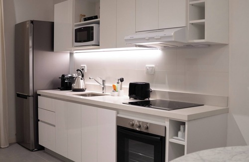 Constitucion Apartment | Vizion Juncal exclusivo departamento para dos personas y huésped menor adicional