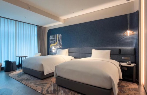 Central Business District Hotel | voco Suites Shenzhen Huanggang by IHG