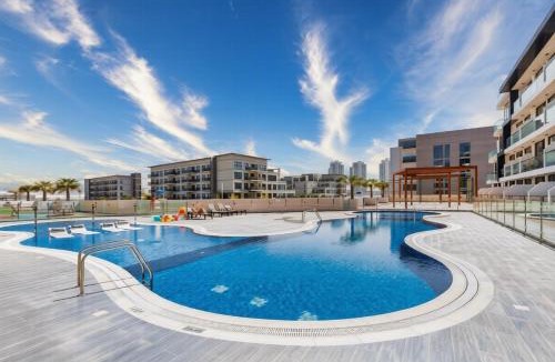Dubai Apartment | Vogue Vacation Homes, Samana Golf Avenue Dubai Studio City near First Avenue Mall, Two Bedroom Apartment with Balcony and Private Pool, Access to all Amenities