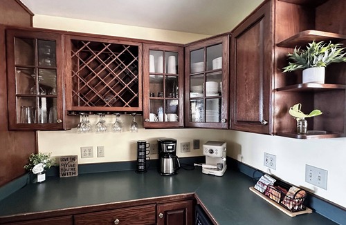 Medford Cottage | Wake to breathtaking sunrises over the rolling hills! Relax by the fire under the stars, & savor sunset dinners beneath fragrant wisteria pergola. Surrounded by wineries and minutes from historic Jacksonville, this retreat blends charm & convenience