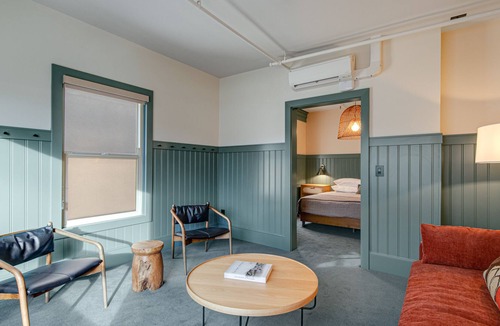 Poulsbo House | Walk everywhere - two luxe rooms at Hotel Scandi with living area & kitchenettes
