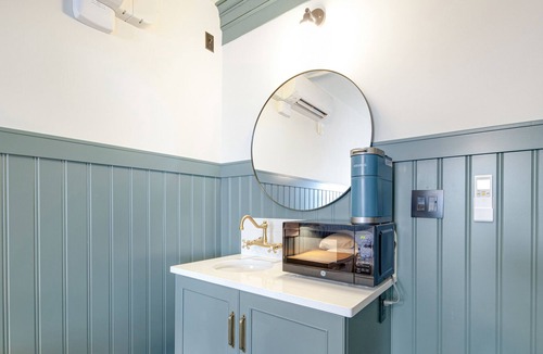 Poulsbo House | Walk everywhere - two luxe rooms at Hotel Scandi with living area & kitchenettes