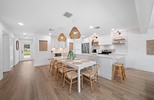 Cocoa Isles House | Walk to beach, riverfront, pool home. Bring your boat!