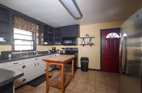 Cotter House | Walk to White River Firepit Grill on deck 3BR Retreat