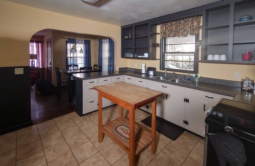 Cotter House | Walk to White River Firepit Grill on deck 3BR Retreat