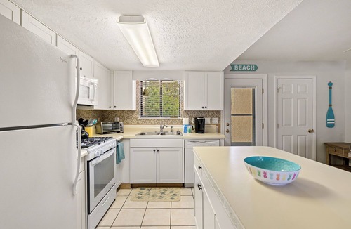Panama City Beach House | ❃ Walkable to Food & Fun ❃ Beach-Front Pool ❃ Canal-Side Home ❃ No Pet Fee