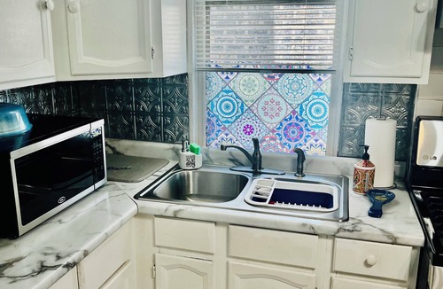 Logan Square House | Walkup Greystone steps to Logan Square restaurants, shopping bars and nightlife.