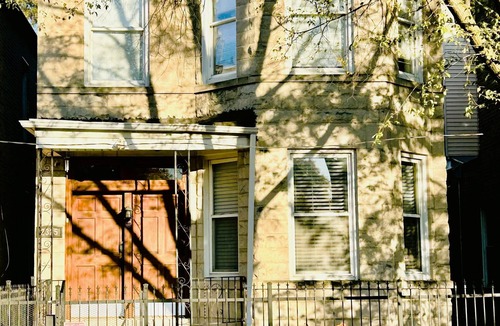 Logan Square House | Walkup Greystone steps to Logan Square restaurants, shopping bars and nightlife.